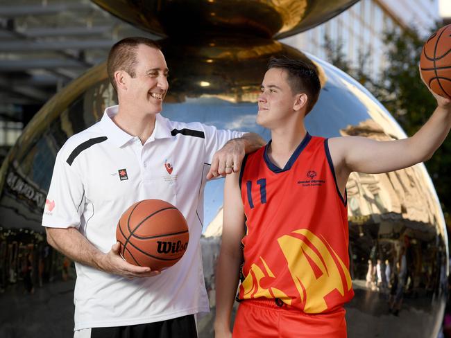 Special Olympics ambassador Brett Maher with special Olympics athlete Nicholas O'Brien. Picture: Naomi Jellicoe