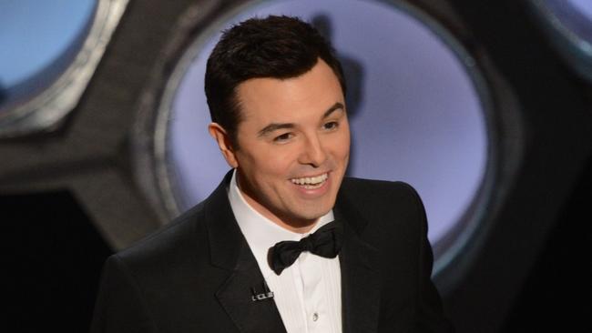 (FILES) Photo dated February 24, 2013 shows Oscars show host Seth MacFarlane on stage at the 85th Annual Academy Awards in Hollywood. MacFarlane said on February 26, 2013 there is "no way" he will do the show again, after his performance was widely criticized as offensive and dull. The "Family Guy" creator insisted it was fun to have hosted the 85th Academy Awards on Sunday, despite media and online critics panning the show, notably for jokes about actresses' breasts and Jews in Hollywood.   AFP PHOTO/FILES/Robyn BECK