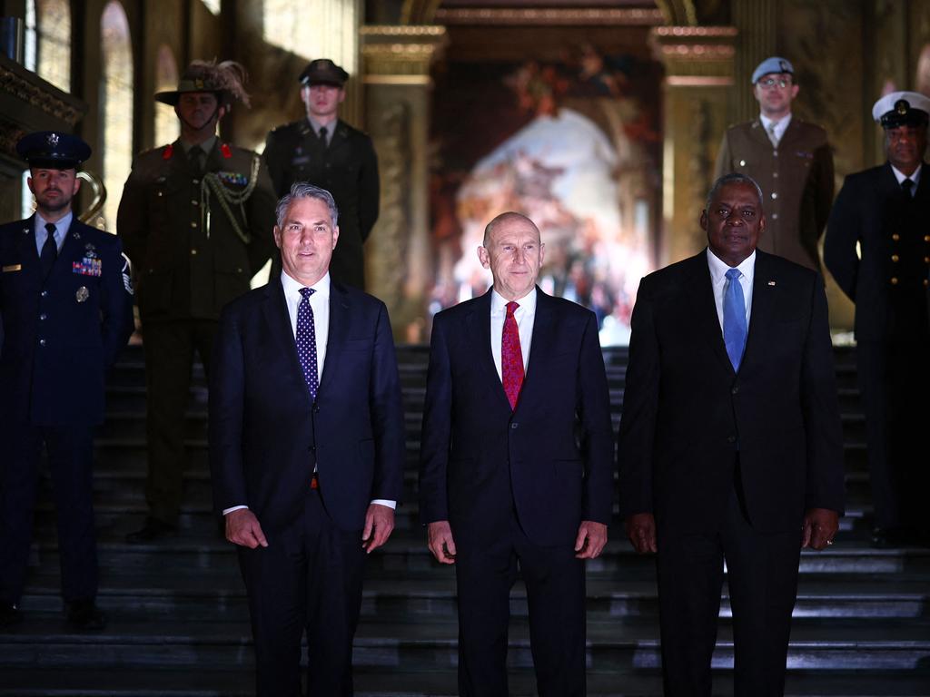 Australian Defence Minister, Richard Marles, Britain's Defence Secretary, John Healey and US Defence Secretary, Lloyd Austin met last month to discuss the pact. Picture: Henry Nicholls/AFP