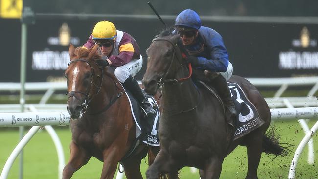 Linebacker (left) slugs it out with Broadsiding in the Champagne Stakes on a Heavy 10 track at Randwick in April. Picture: Jeremy Ng/Getty Images