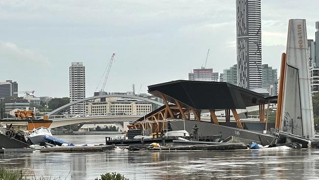 The Milton ferry terminal strewn with debris including a powerboat.