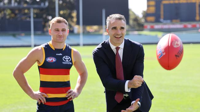 Premier Peter Malinauskas with the Adelaide Crows’ Rory Laird oat Adelaide Oval in April. Picture: NCA NewsWire / David Mariuz