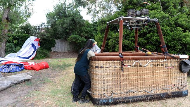 The balloon’s basket touched down just metres from several homes. Picture: Andrew Henshaw