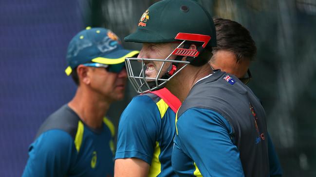 Shaun Marsh was hit on the wrist by a fast Pat Cummins delivery.