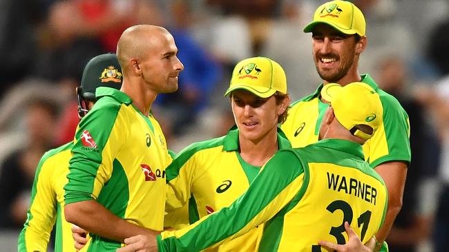 CAPE TOWN, SOUTH AFRICA - FEBRUARY 26: Adam Zampa of Australia takes a catch to dismiss Rassie van der Dussen of South Africa during the 3rd KFC T20 International match between South Africa and Australia at Newlands Cricket Stadium on February 26, 2020 in Cape Town, South Africa. (Photo by Ashley Vlotman/Gallo Images/Getty Images)