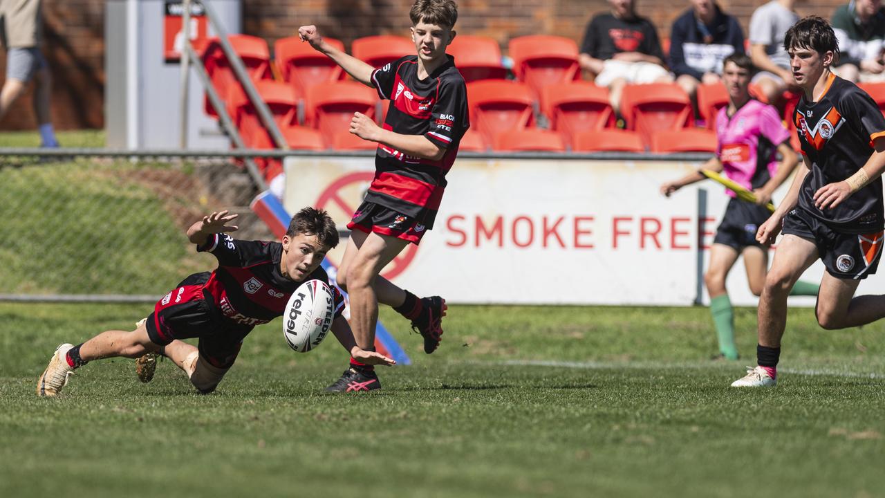 James Morcom scrambles to get possession for Valleys against Southern Suburbs in U13/14 boys Toowoomba Junior Rugby League grand final at Toowoomba Sports Ground, Saturday, September 7, 2024. Picture: Kevin Farmer