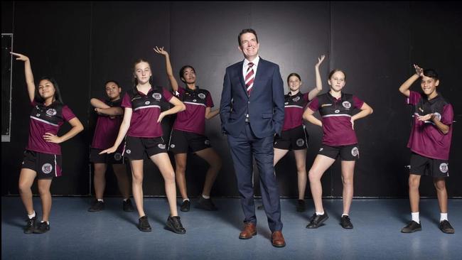 Marsden State High School principal Andrew Peach with some of his students who have made the school the largest in Australia.