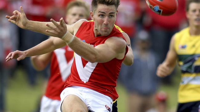 Brock Castree on the go for North Adelaide. Picture: AAP Image/Dean Martin