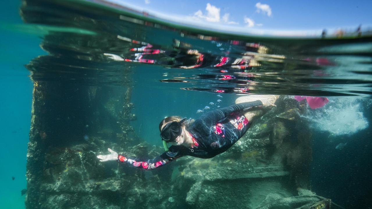 Anna Coyne from Brisbane exploring the Tangalooma Wrecks on Moreton Island. Picture Lachie Millard