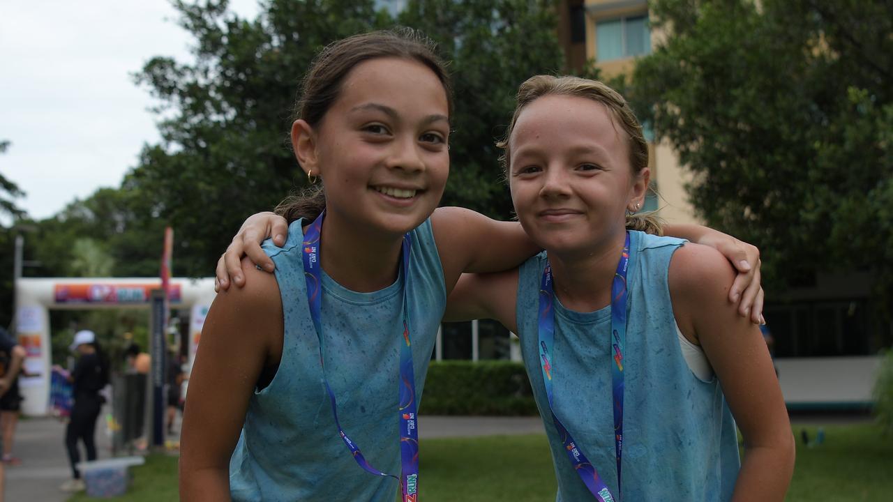 Olive Freeman-Knox and Freya Galati finishes the Australia Day 2023 fun run at Darwin Waterfront. Picture: (A)manda Parkinson