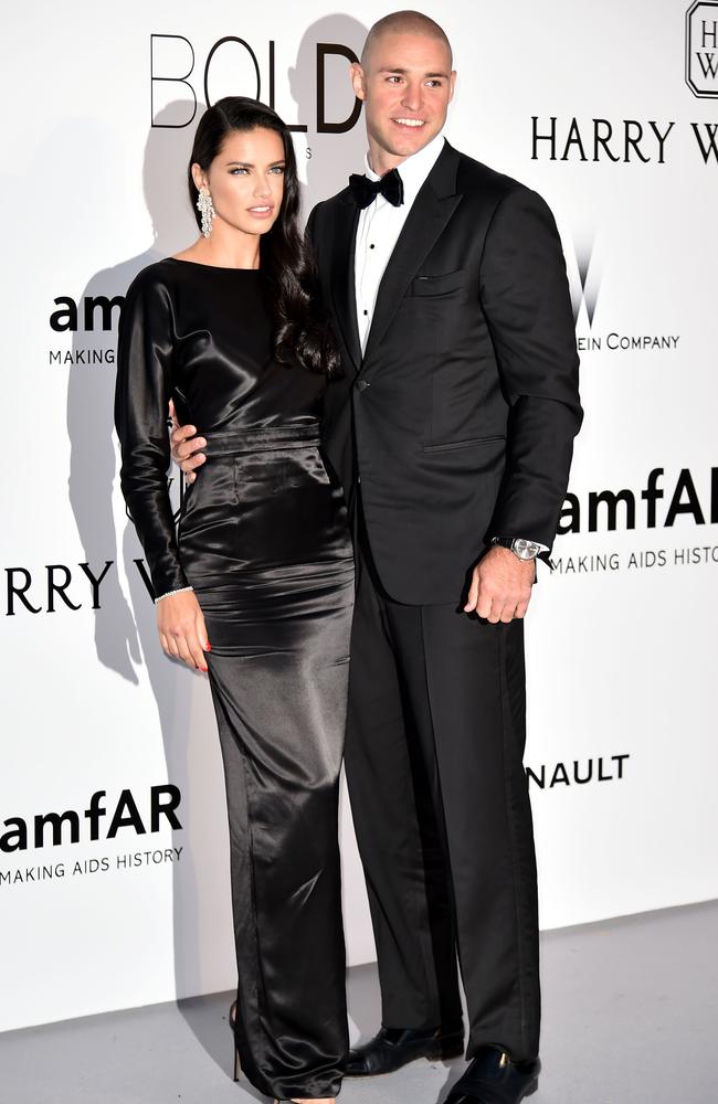 Brazilian model Adriana Lima (L) and her partner Joe Thomas pose as they arrive for the amfAR’s 23rd Cinema Against AIDS Gala on May 19, 2016 in Antibes, southeastern France. Picture: AFP PHOTO / ALBERTO PIZZOLI