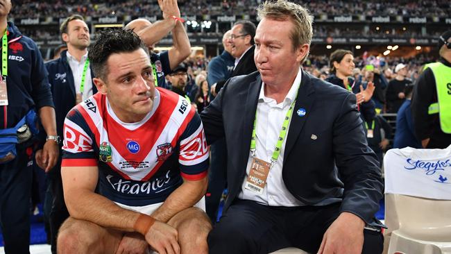 Cooper Cronk celebrates winning 2018 NRL grand final with Roosters coach Trent Robinson.