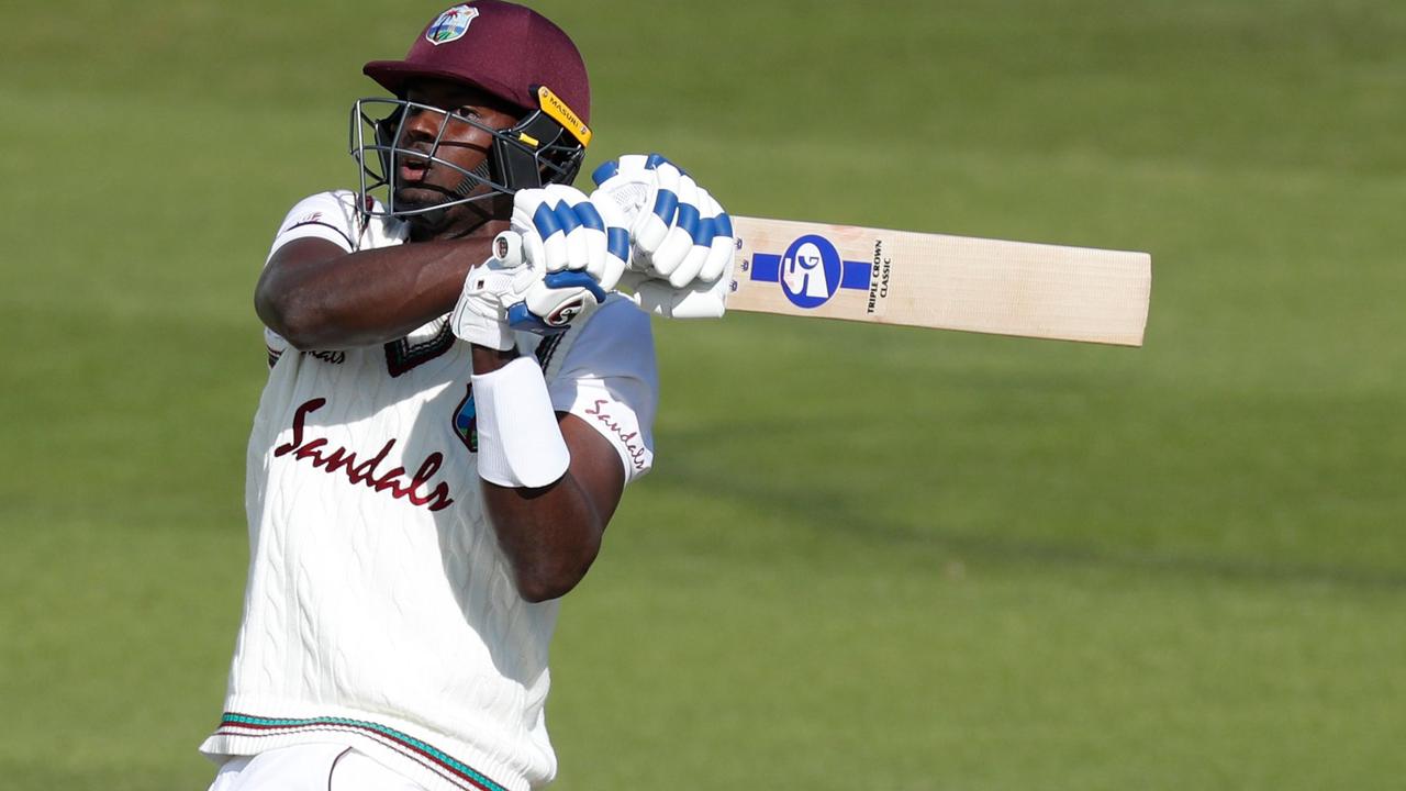 West Indies' Jason Holder plays a stroke to lose his wicket off the bowling of England's Ben Stokes on the third day of the first Test cricket match between England and the West Indies at the Ageas Bowl in Southampton, southwest England on July 10, 2020. (Photo by Adrian DENNIS / POOL / AFP) / RESTRICTED TO EDITORIAL USE. NO ASSOCIATION WITH DIRECT COMPETITOR OF SPONSOR, PARTNER, OR SUPPLIER OF THE ECB