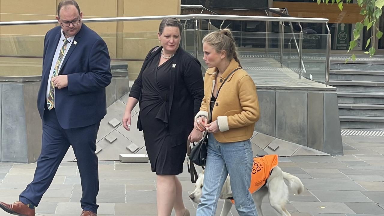 Katrina Munting (centre) and former Australian of the Year Grace Tame (right) outside the Supreme Court of Tasmania. Picture: Amber Wilson