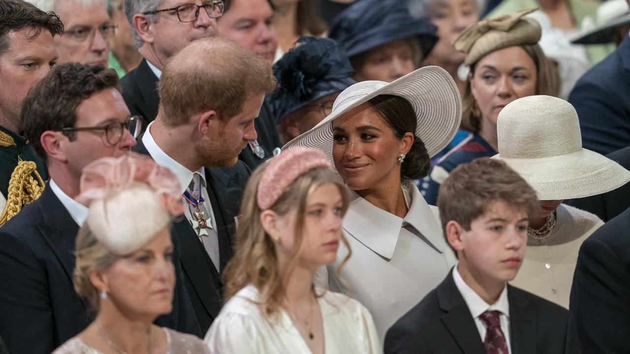 Prince Harry and Meghan Markle behind teenager James, Viscount Severn at the service of thanksgiving for the Queen on June 3, 2022. Picture: Arthur Edwards/WPA Pool/Getty Images