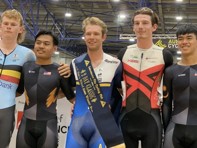 Graeme Frislie (centre) won a drama-filled edition of the Launceston Wheelrace on Thursday night. Picture: Jon Tuxworth