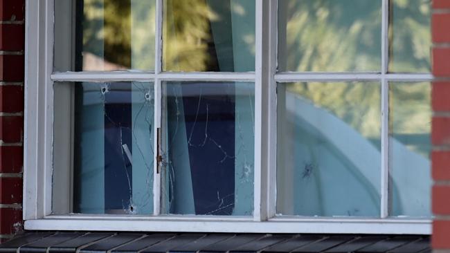 The bullet-ridden window in the Thomastown where a man was fatally shot. Picture: Nicole Garmston