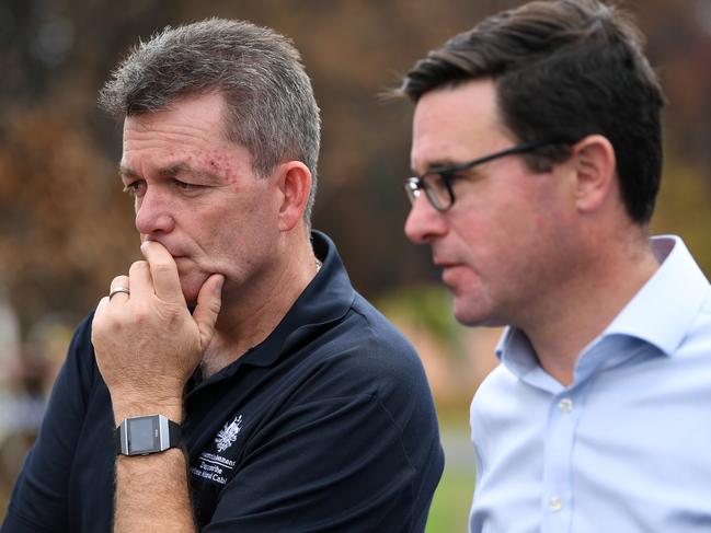 National Bushfire Recovery Agency chief Andrew Colvin (left) and Minister for Natural Disaster David Littleproud (right) speak with locals at Bilpin on January 13. Picture: AAP