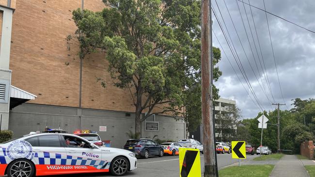 Emergency services swarmed the scene of the collision at Rembrandt St, Carlingford, outside the shopping centre.