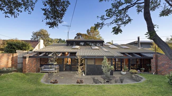 The charming facade of the Beaumaris mid-century home that sparked fierce bidding at auction.