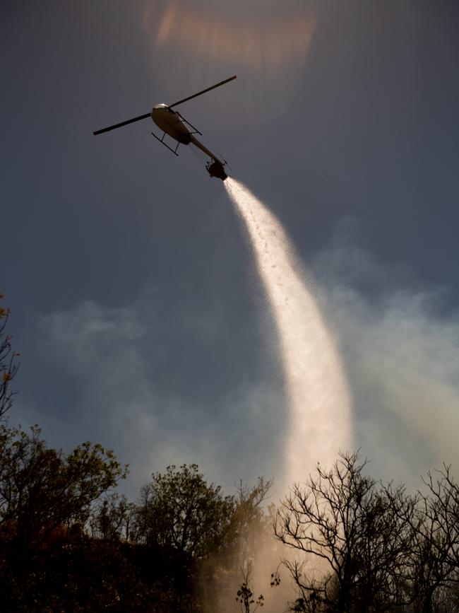 A bushfire threatens homes and properties in the idyllic Lake Bennett regio in late August. Multiple helicopters and volunteer firefighting units battled the blaze for two days. Picture: Che Chorley
