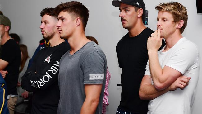 Riley Knight (middle) watched new Crows coach Matthew Nicks’ introductory press conference, alongside Adelaide teammates, from left, Luke Brown, Taylor Walker and Rory Sloane. Picture: MARK BRAKE (Getty Images).