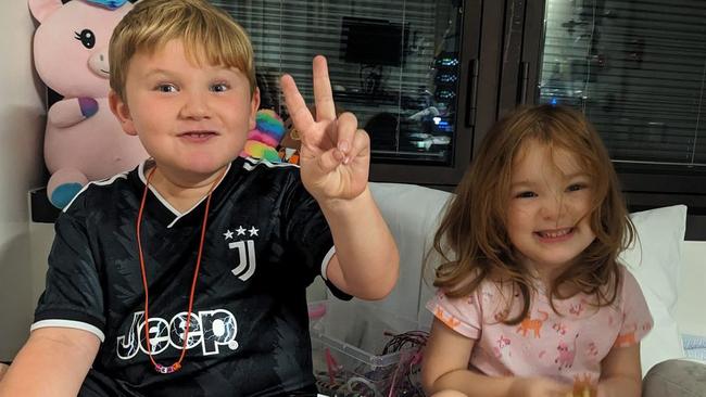 Tessa Perry with her brother Remy Perry in hospital. Picture – contributed.