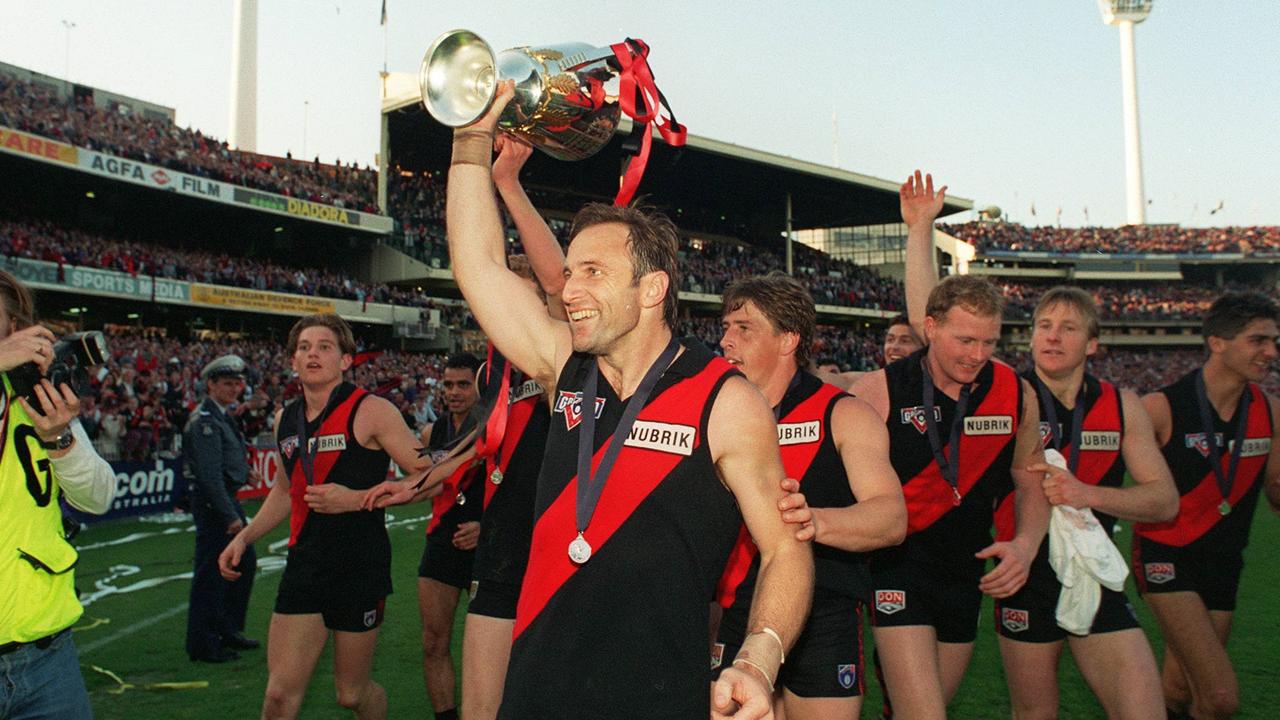 Tim Watson (centre) and James Hird (far left) won the 1993 premiership together.