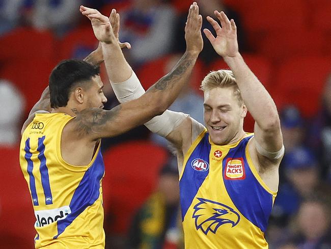 MELBOURNE, AUSTRALIA - AUGUST 20: Oscar Allen of the Eagles (R) celebrates with Tim Kelly of the Eagles after kicking a goal during the round 23 AFL match between Western Bulldogs and West Coast Eagles at Marvel Stadium, on August 20, 2023, in Melbourne, Australia. (Photo by Daniel Pockett/Getty Images)