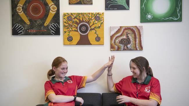 South Grafton year 10 student Caitlin Eggins, and year 9 student Sharlee Cook are all smiles about being chosen for the $20,000 Harding Miller Education Foundation Scholarship. Photo: Adam Hourigan