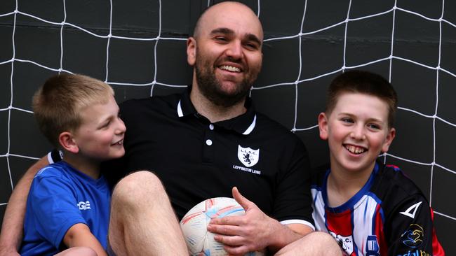 NETWORK SPECIAL. , PLEASE CONTACT NETWORK PICTURE DESK BEFORE PUBLISHING.     , 17/01/2025.  Health of the Nation 2025. Steve Fazio plays soccer with his sons Lucas 11 and Zac 9 in their backyard. Picture Jeff Darmanin