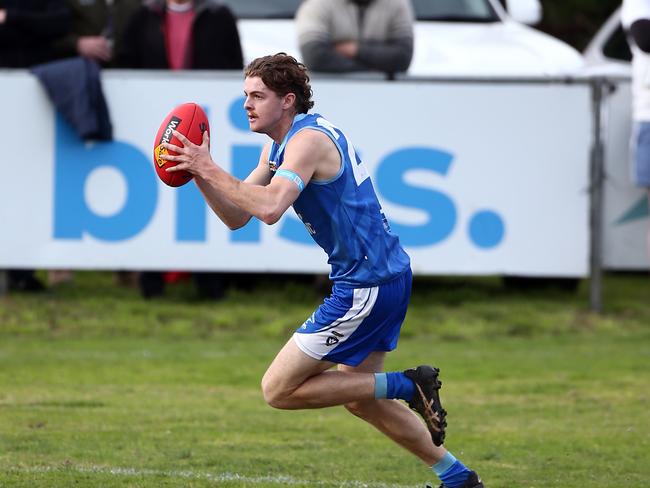 Wiltshire runs with the ball in for Barwon Heads.