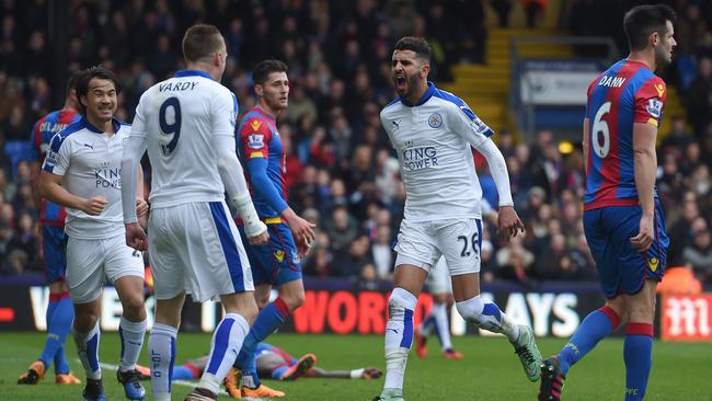 LONDON, ENGLAND - MARCH 19: Riyad Mahrez (R) of Leicester City celebrates scoring his team's first goal with his team mate Jamie Vardy (L) during the Barclays Premier League match between Crystal Palace and Leicester City at Selhurst Park on March 19, 2016 in London, United Kingdom. (Photo by Michael Regan/Getty Images)