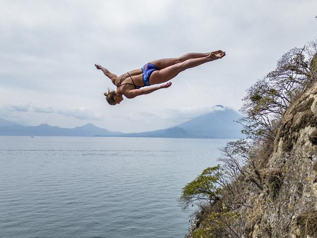 Rhiannan Iffland, pictured during the Red Bull Cliff Diving World Series in 2023. revealed she was afraid of heights on the Mental As Anyone podcast. Picture: Dean Treml/ Red Bull