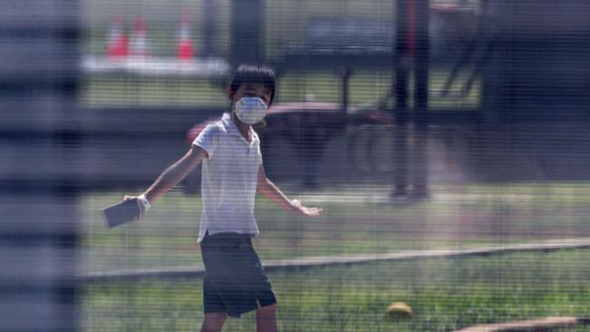 This child will be one of 242 people to leave quarantine on Christmas Island on Monday. Picture: Colin Murty