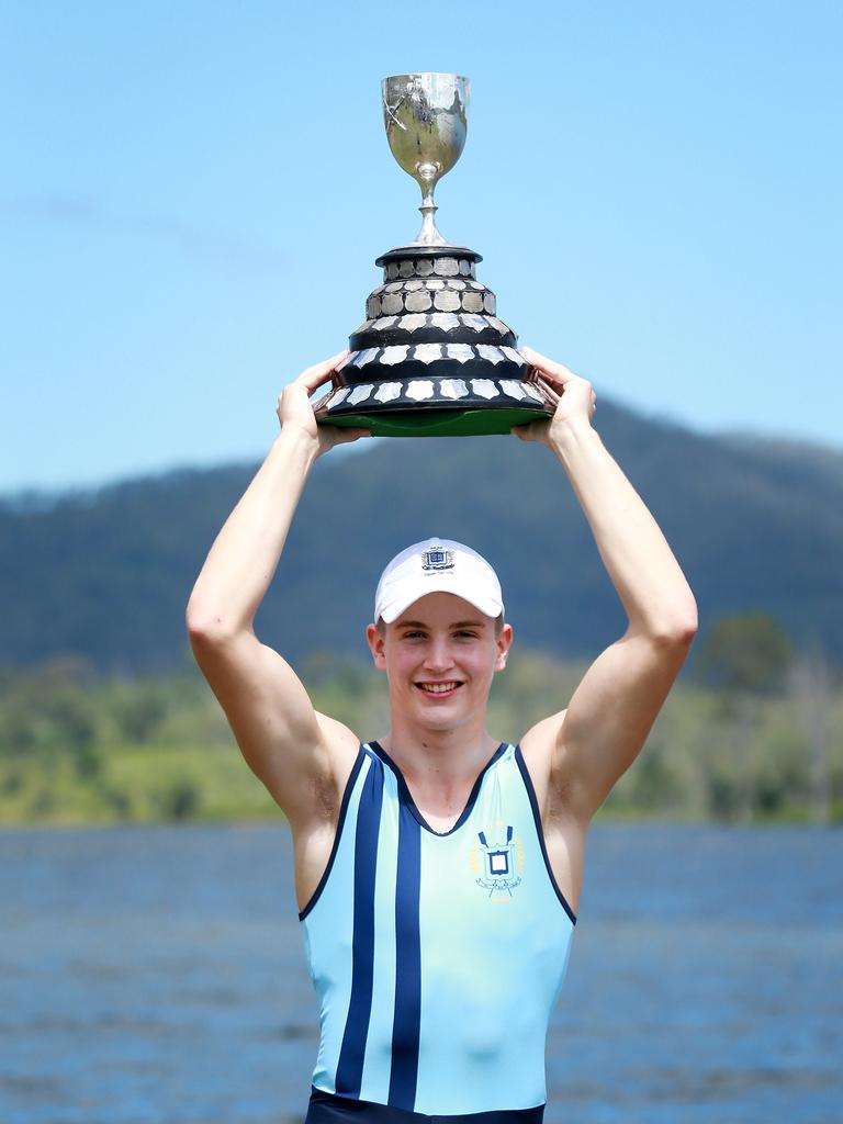 Brisbane Grammar School rowing captain Hugh Weightman with the team’s winning trophy at the GPS Head of the River, Lake Wyaralong. Picture: Sarah Marshall/AAP