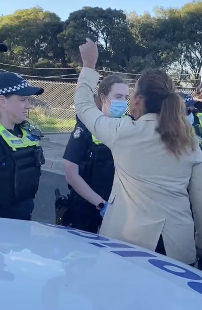 Greens Senator Lidia Thorpe confronts Victoria Police officers after the decision to move 12 people to a Christmas Island detention centre. Picture: Twitter/@SenatorThorpe