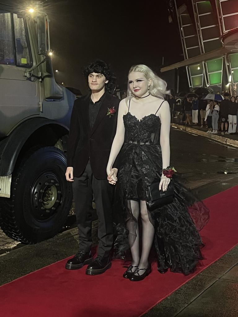 Ronan Woods and Ella Gunn arrive at the formal.