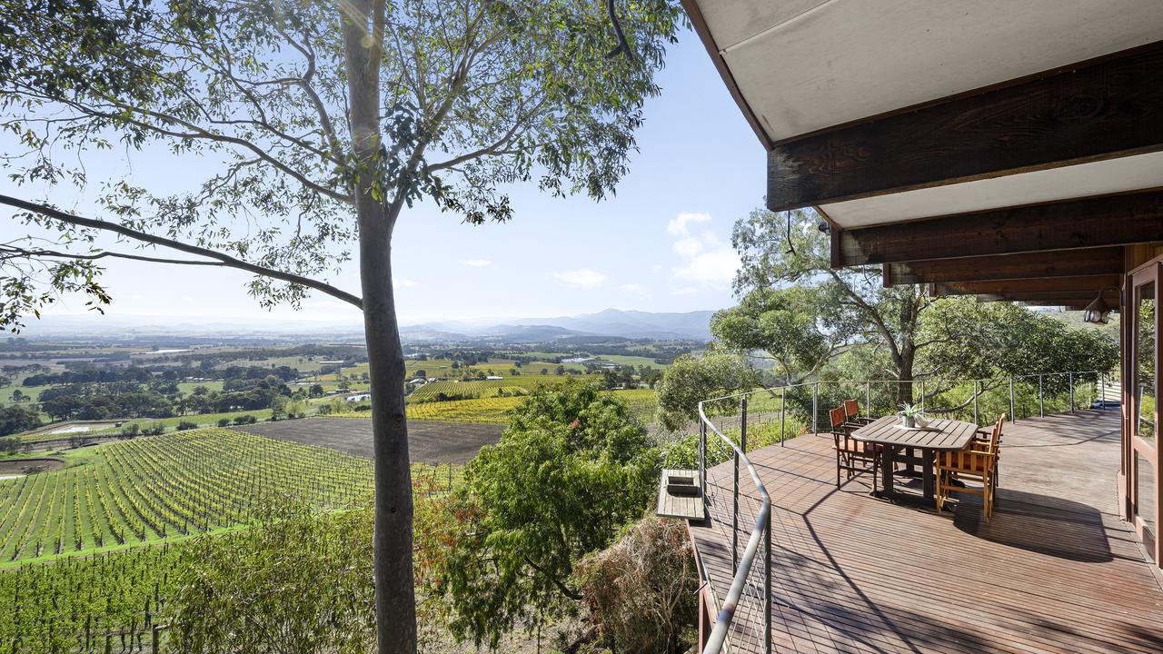 Take in valleys of vineyards from this Yarra Valley home