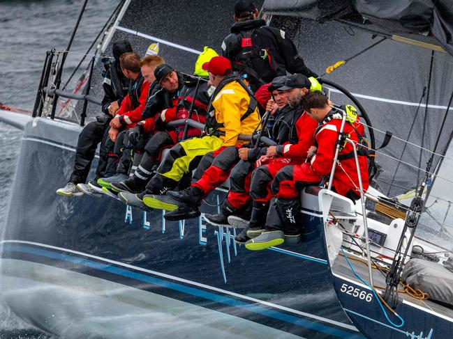 This handout image taken on December 28 and received from Rolex on December 30, 2023 shows the yacht Alive during the annual Sydney to Hobart yacht race in Hobart. Australian yacht Alive was December 30 crowned the overall winner of the prestigious Sydney-Hobart race, overcoming perilous storms that forced several damaged competitors to retire. (Photo by Kurt Arrigo / ROLEX / AFP) / RESTRICTED TO EDITORIAL USE - MANDATORY CREDIT "AFP PHOTO / ROLEX / KURT ARRIGO" - NO MARKETING NO ADVERTISING CAMPAIGNS - DISTRIBUTED AS A SERVICE TO CLIENTS - NO ARCHIVE