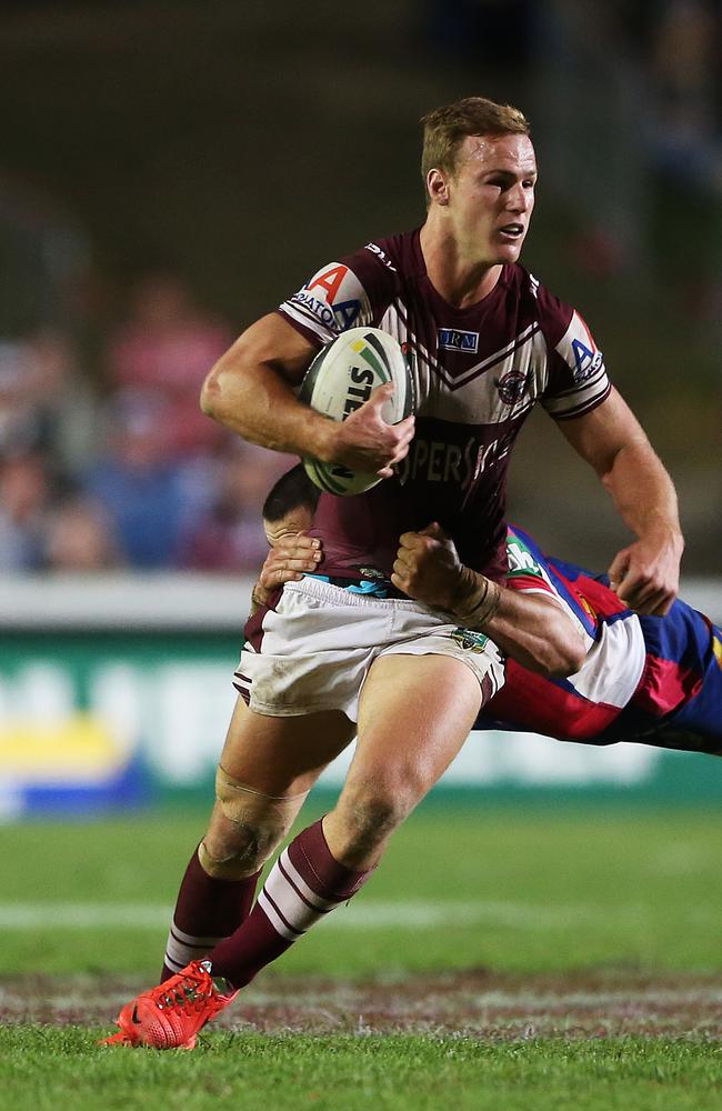 Manly's Daly Cherry-Evans makes a break against the Knights.