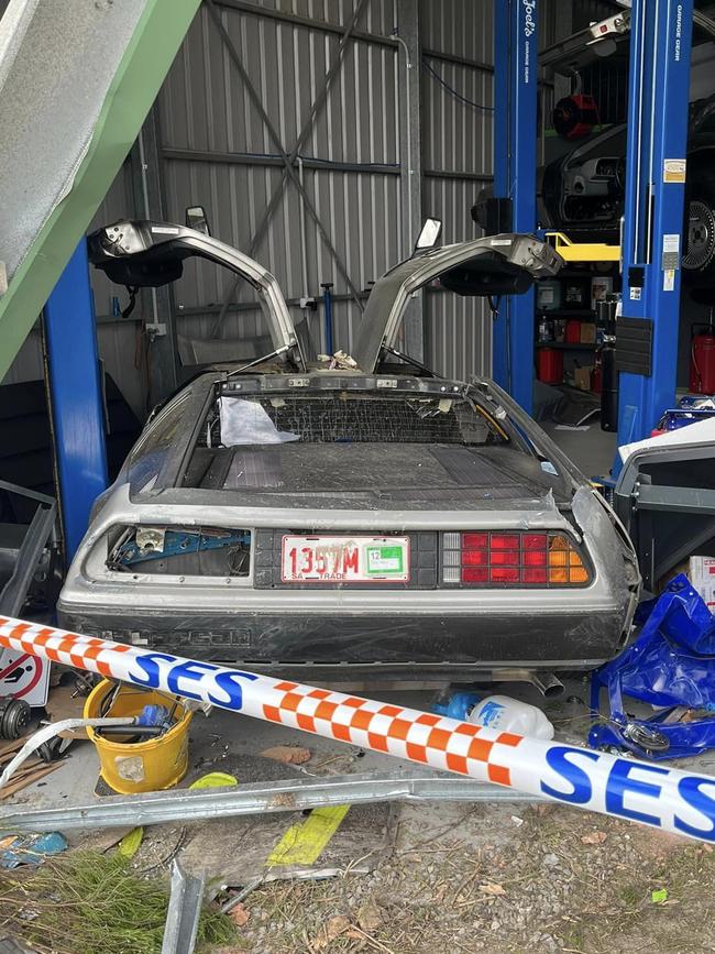 Inside DeLorean Dynamics’ workshop after the crash.