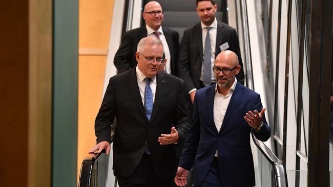 Scott Morrison and BCA president Tim Reed arrive at the dinner in Sydney on Monday night. Picture: AAP