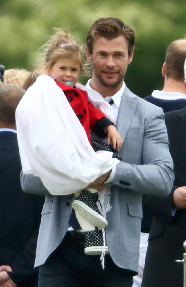 Cute ... India Rose has the best seat in the house ... in daddy’s arms. Picture: Getty