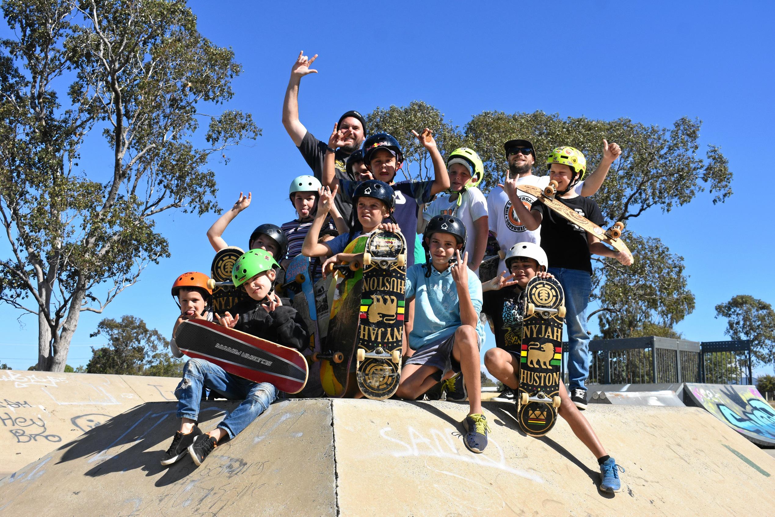 Jay Hetherington of Gold Coast Skateboard Coaching and local kids of Roma were stoked to skate together in Roma. Picture: Jorja McDonnell