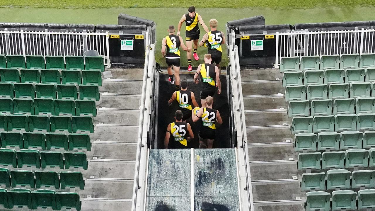 Trent Cotchin leads the Tigers out onto an empty MCG last season. Picture: Michael Dodge/AAP