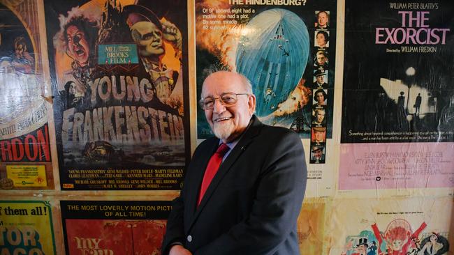 Mayor John Trainer, pictured inside the old Windsor Theatre, wants the posters inside the cinema to be catalogued or saved. Picture: AAP Image/Morgan Sette