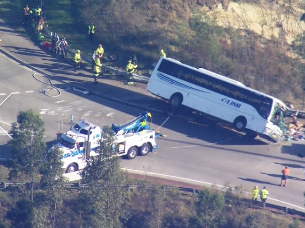 The bus was righted with a tow truck and is currently being investigated by police. 9 News