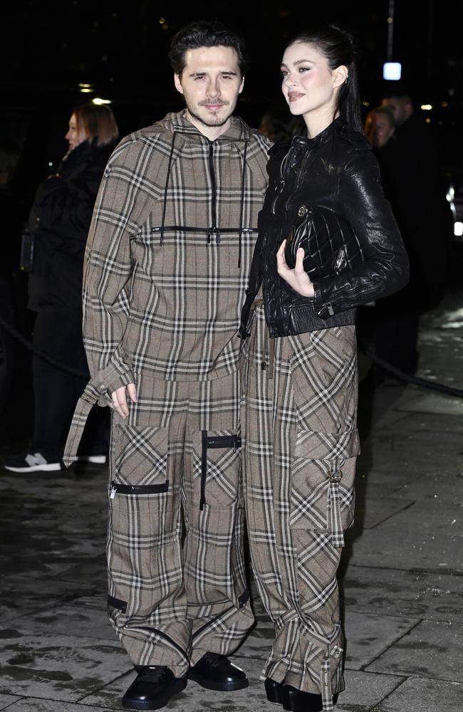 Brooklyn and Nicola Peltz Beckham at the Burberry show during London Fashion Week in February this year. Picture: Gareth Cattermole / Getty Images