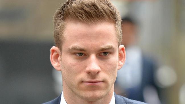 ADJUSTED CROP TO STRAIGHTEN HEADSHOT Lukas Kamay leaves the Melbourne County court. NAB banker Lukas Kamay and uni mate Chris Hill to plead guilty to a $7 million insider trading scam. Picture: Nicole Garmston Deary id